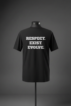 Back view of black Exoticool Transphobes Are Trash Tee on mannequin featuring “Respect. Exist. Evolve.” statement graphic