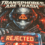 Macro close-up of Transphobes Are Trash graphic showing alien visor, REJECTED message and detailed red, blue and white DTG ink on black fabric